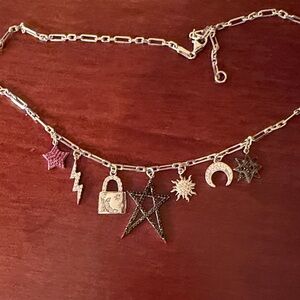 Sterling silver charm necklace.